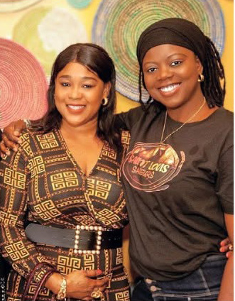 Friends smiling together at Saint Louis Saveurs