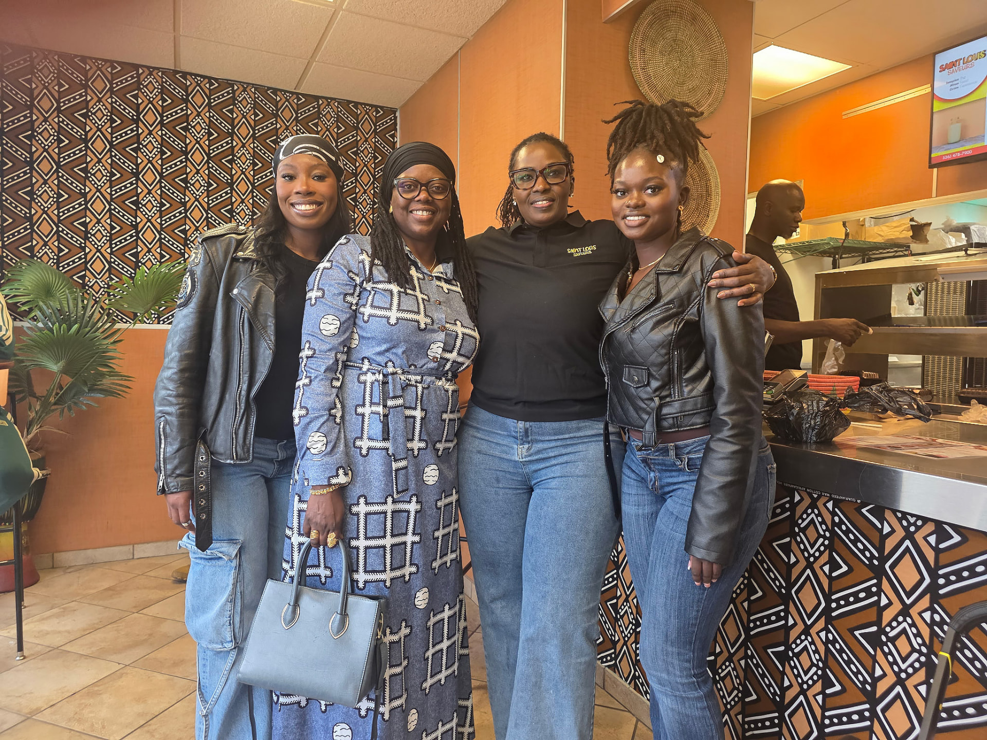 Friends together inside Saint Louis Saveurs
